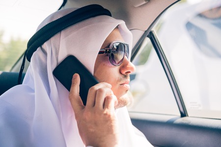 Young Arabian Man Sitting In The Carの写真素材