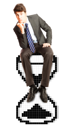 Businessman Sitting on Hourglassの写真素材