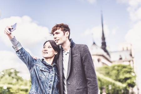 Young Multi-ethnic Couple in Paris, Franceの写真素材