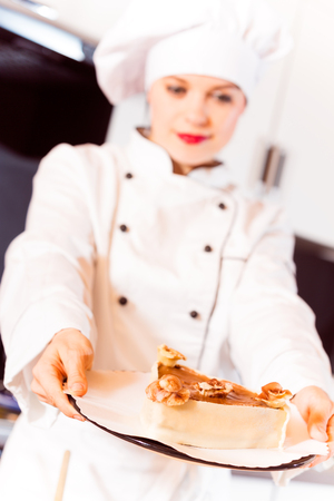 Confectioner Baking A Cakeの写真素材