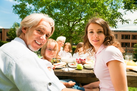 Big Family Having A Picnic In The Gardenの写真素材