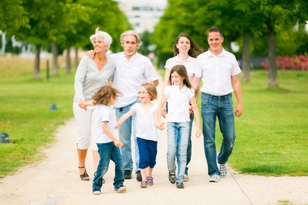 Big Family Walking Through The Parkの写真素材