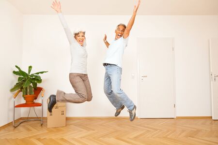 Senior Couple Moving Into A New Apartment