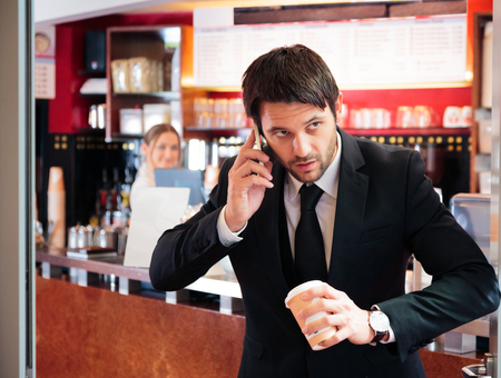 Stressed Businessman Getting His Early-morning Coffeeの写真素材
