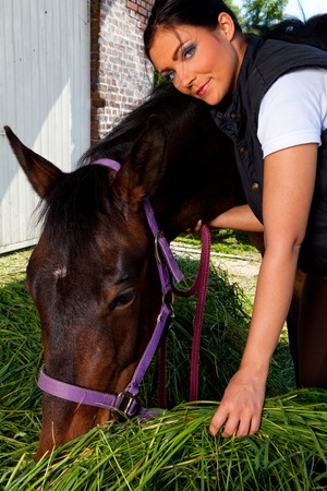 Young Woman On Horse Ranchの写真素材