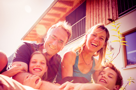 Family Of Four In Their Back Yardの写真素材