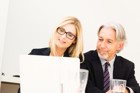 Business Team Looking At Laptopの写真素材