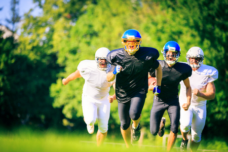 American Football Players Runningの写真素材