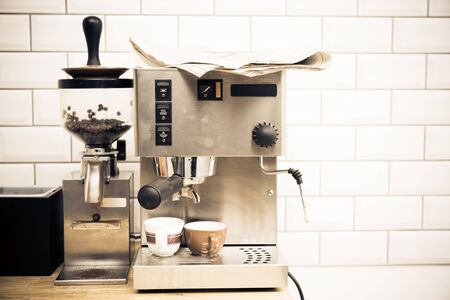 Coffee Machine With Newspaperの写真素材