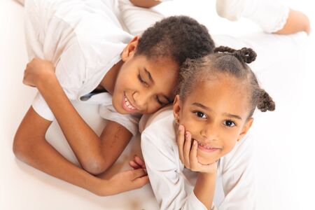 Mixed-race Children Playing On The Floorの写真素材