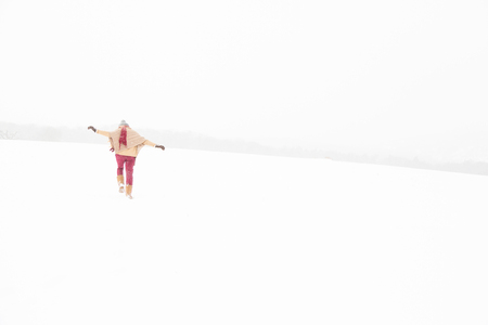 Young Woman Enjoying Winterの写真素材