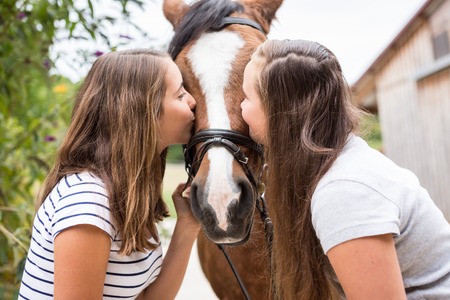 Teenage Girls With Their Ponyの写真素材