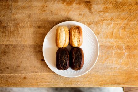Some Freshly Baked And Some Burnt Bunsの写真素材
