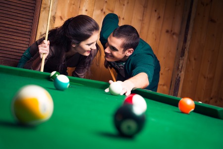 Couple Playing Poolの写真素材