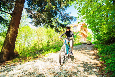Young Woman Riding Her Mountain Bikeの写真素材