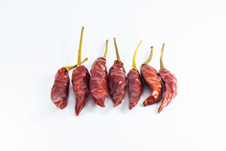 red dried chili on white backgroundの写真素材