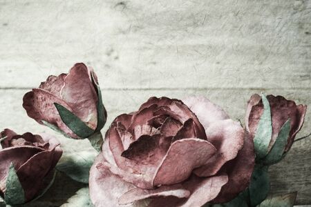rose on wooden in vintage color styleの写真素材