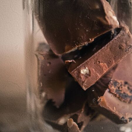 chocolate pieces in the glass bottle