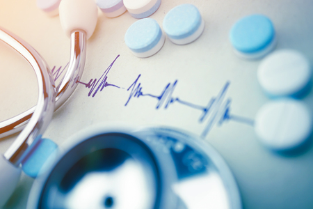 stethoscope and pill medical conceptの写真素材