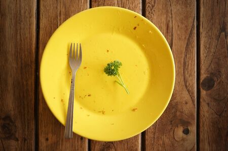 empty dish on the tableの写真素材