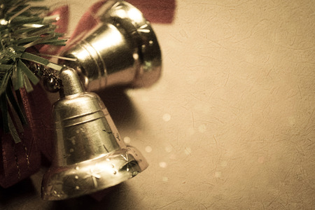 Bell christmas decorations on mulberry paper texture for backgroundの写真素材