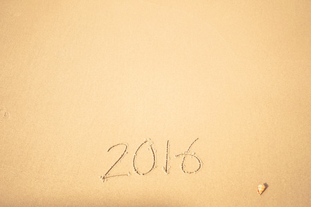 2016 text on the beach for new year concept backgroundの写真素材