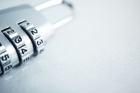 combination padlock in blur style for security concept backgroundの写真素材