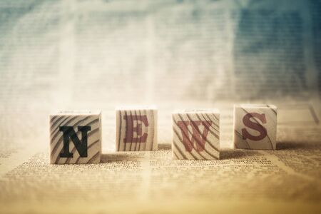 news word on wooden blocks for news concept backgroundの写真素材