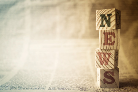 news word on wooden blocks for news concept backgroundの写真素材