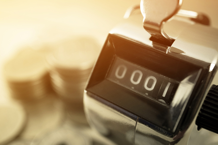 " time to start " headcount at number 1 on rows of coins background for finance and banking conceptの写真素材
