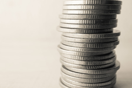 rows of coins for finance and banking concept background