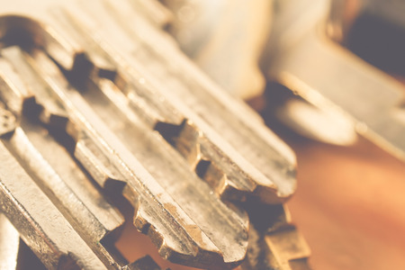 Bunch of keys on a wooden tableの写真素材