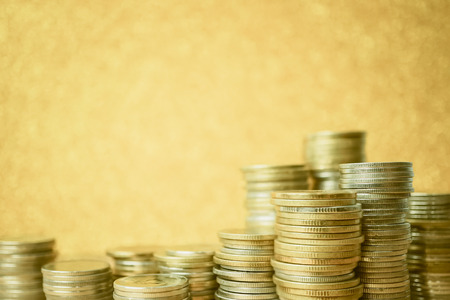 rows of coins and account for finance and banking conceptの写真素材