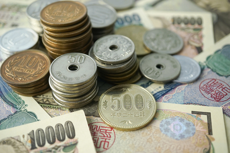 yen notes and yen coins for money concept backgroundの写真素材