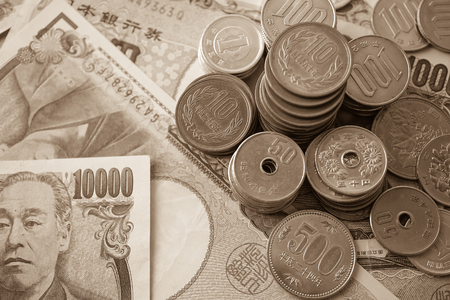 yen notes and yen coins for money concept backgroundの写真素材
