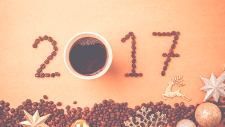 2017 coffee beans and christmas decorations in vintage style for new year conceptの写真素材