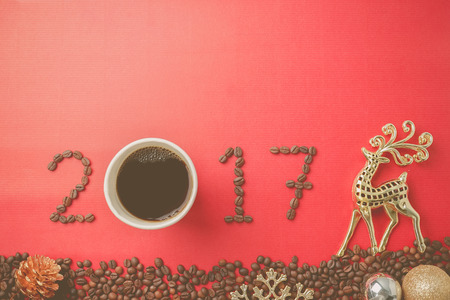2017 coffee beans and christmas decorations in vintage style for new year conceptの写真素材