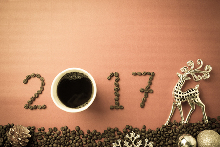 2017 coffee beans and christmas decorations in vintage style for new year conceptの写真素材
