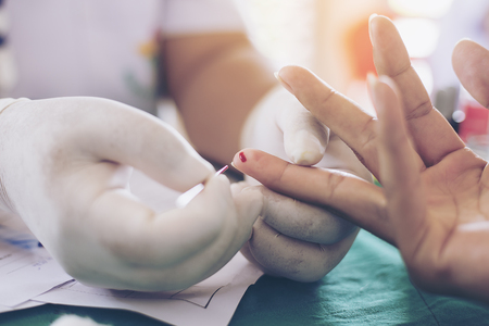 Blood fingertipsの写真素材