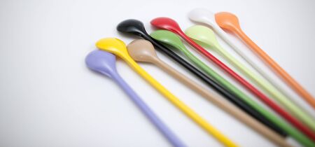 Multi-colored spoon Brown, purple, yellow, green, red,white,blackの写真素材