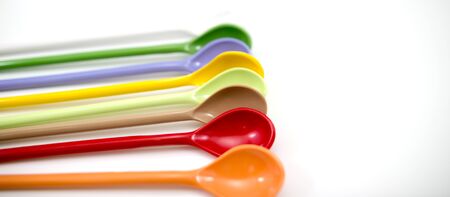 Multi-colored spoon Brown, purple, yellow, green, red,whiteの写真素材