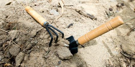 Spade shovel embroidery on the ground.の写真素材
