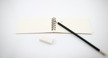 notebook with pencil and eraser.の写真素材