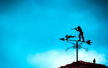 Wind turbines and an arrow hunters
