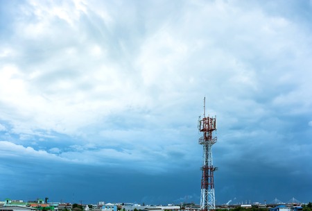 Telecommunication antenna and nimbus in the skyの写真素材