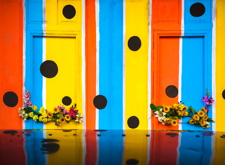 Colorful patterns on the wall with a reflectionの写真素材