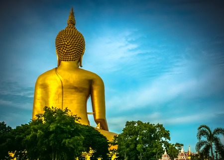 Behind of buddha statue with beautiful cloudsの写真素材