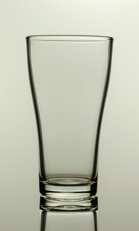 Glass of water with shadow.の写真素材