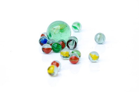Colorful glass marbles, on white backgroundの写真素材