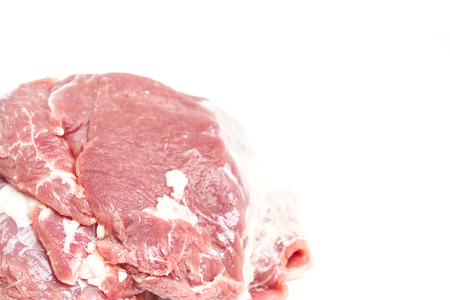 Fresh pork on a white plateの写真素材